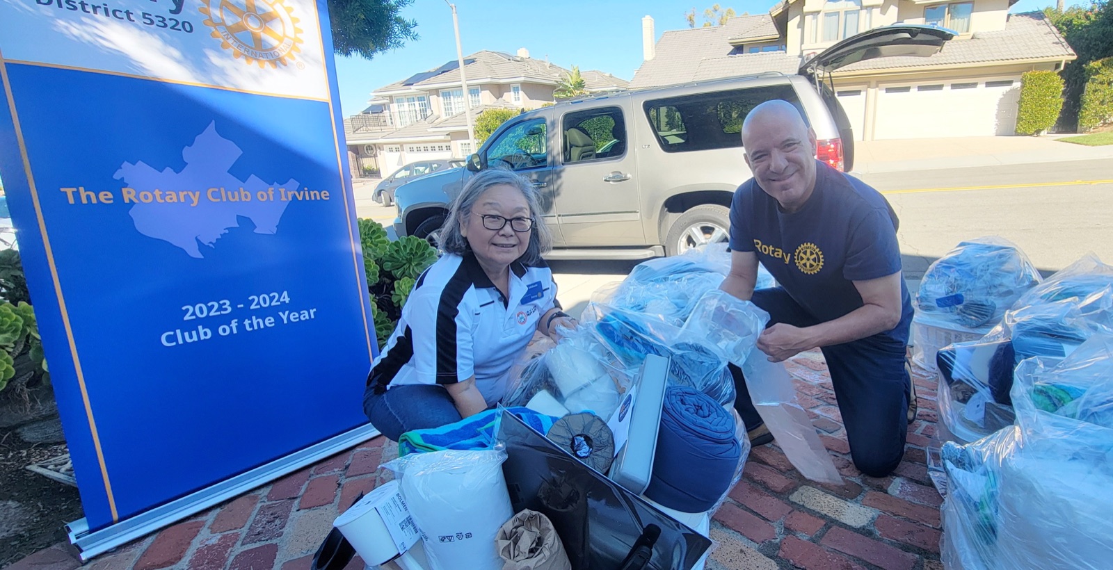 Irvine Rotarians packing home baskets for formerly unhoused veterans with Mercy House