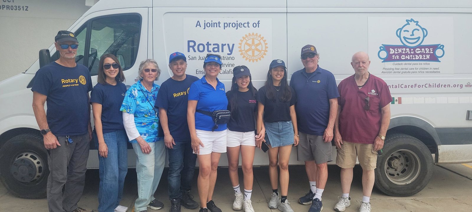 Irvine Rotarians and Soka University Rotaractors in front of the Rotary dental care van in Ensenada